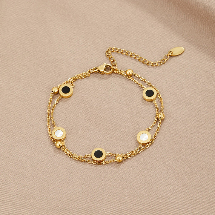 Victoire | Armbånd i onyx og hvid sten