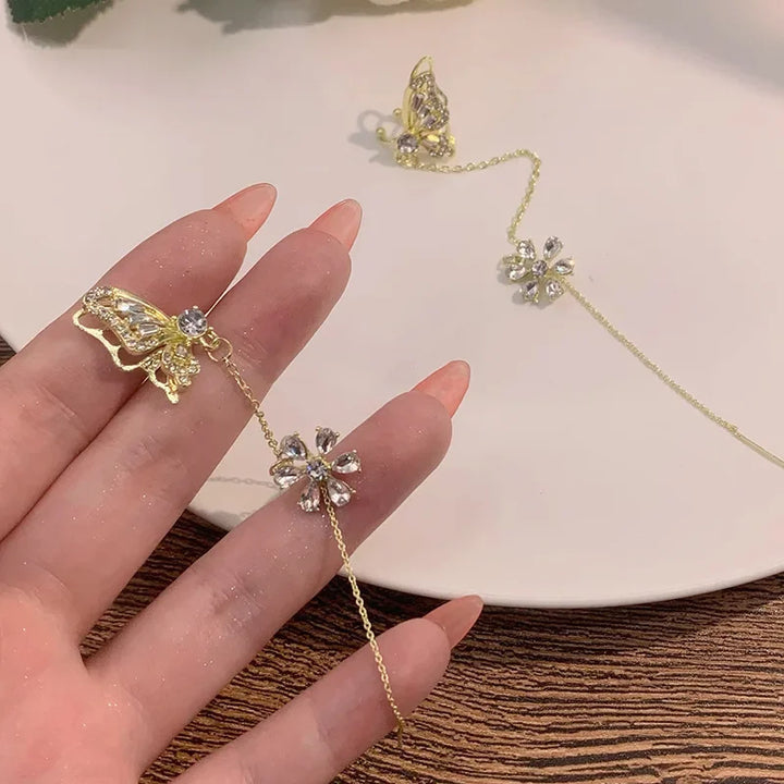 Marie | Ear cuff med sommerfugl og blomst